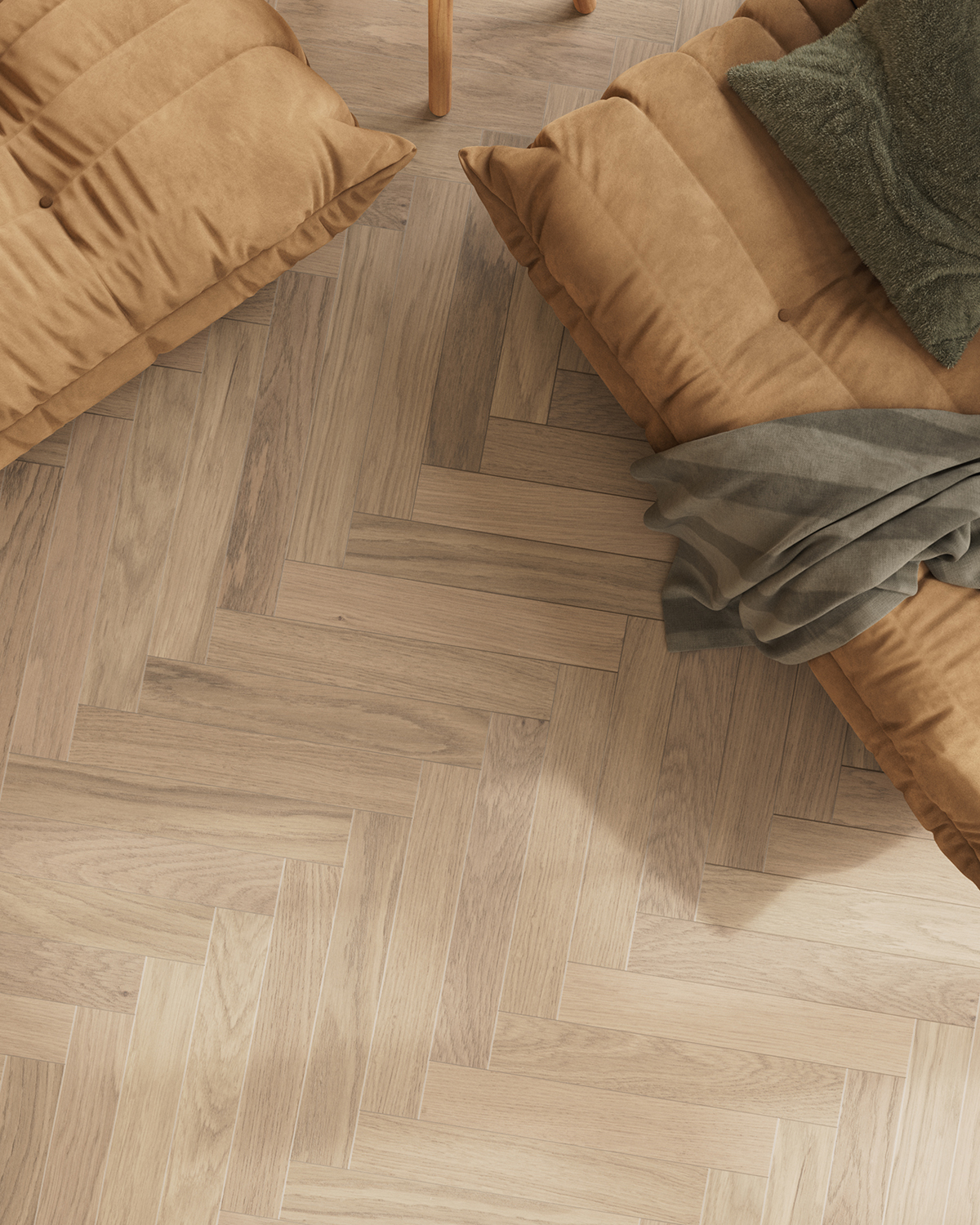Woodura Herringbone 2.0 by Bjelin with the edges of two couches showing