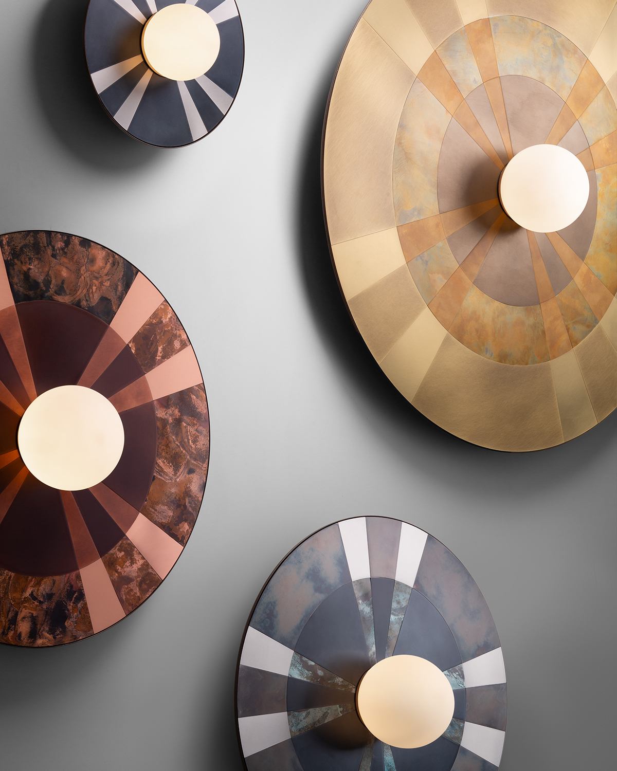 4 Caleide wall lamps of different colours from De Castelli