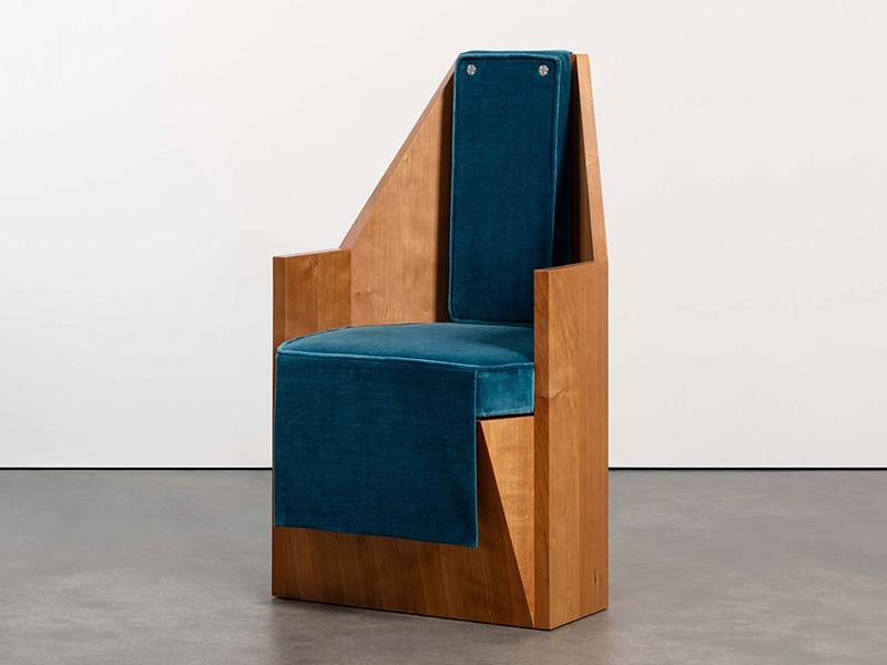 Formafantasma: Formation item—blue chair with wooden armrests in their contemporary furniture exhibition at Friedman Benda