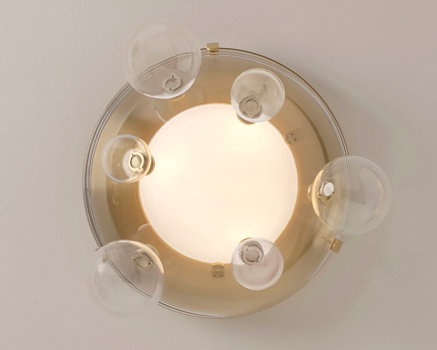lit up Aria lamp from Gaspere Asaro with 4 protruding light bulbs
