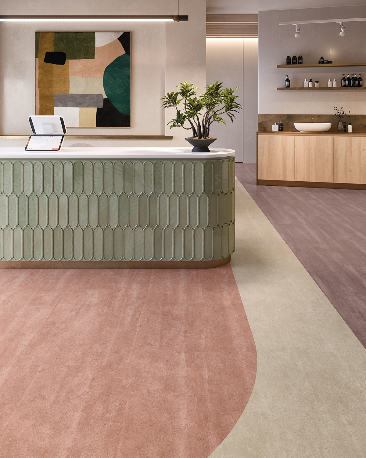 Chromascope 2.5 by Mohawk Group in salmon, beige and mauve coloured carpeting with green and white front desk