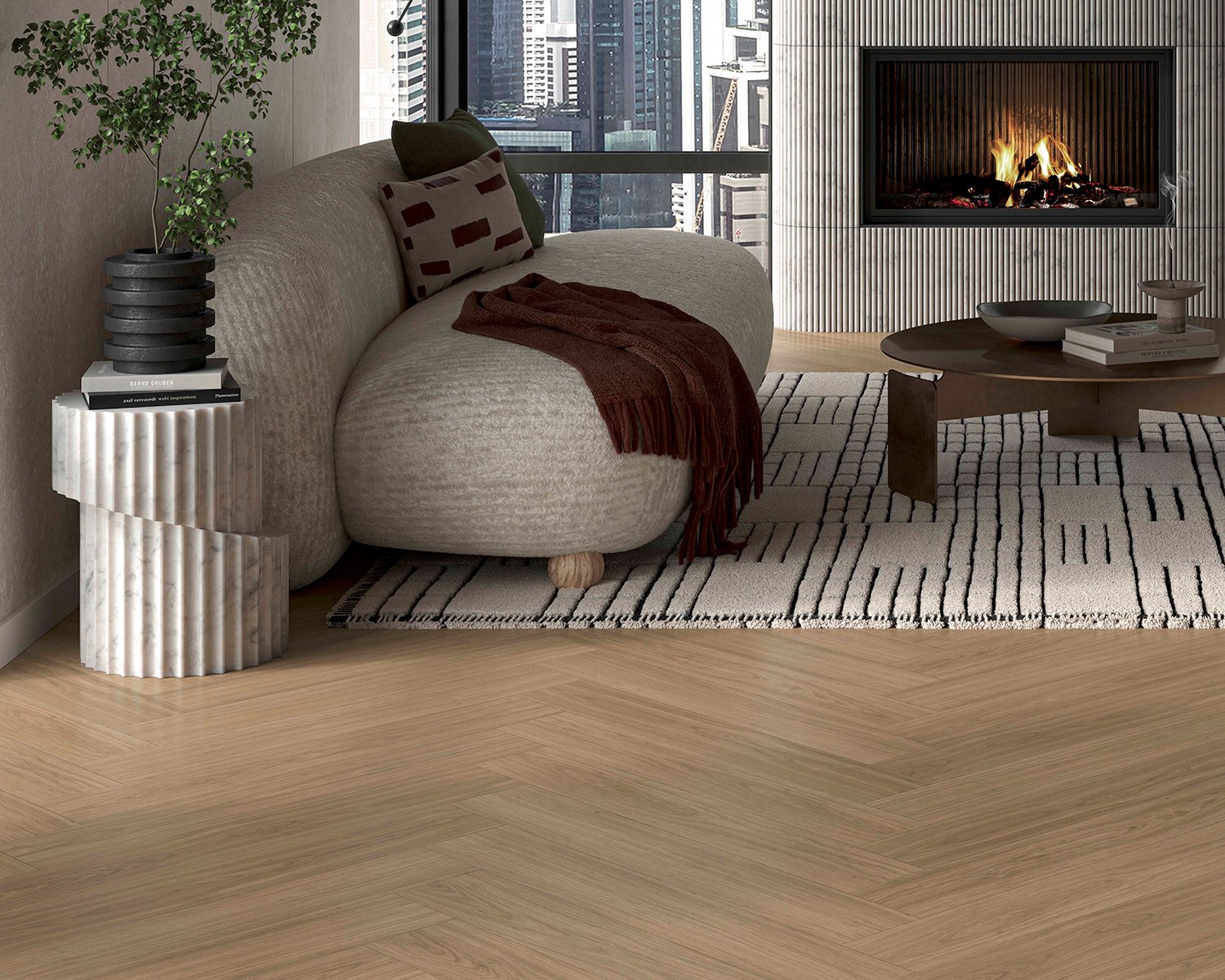 Modular ONE Herringbone by Parador under a black and white rug and white couch and side table