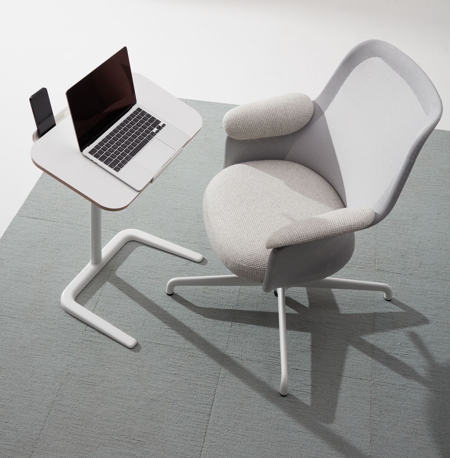 The Aarea chair and Cosi laptop table are designed for an ever-changing era of workplace uncertainty.
