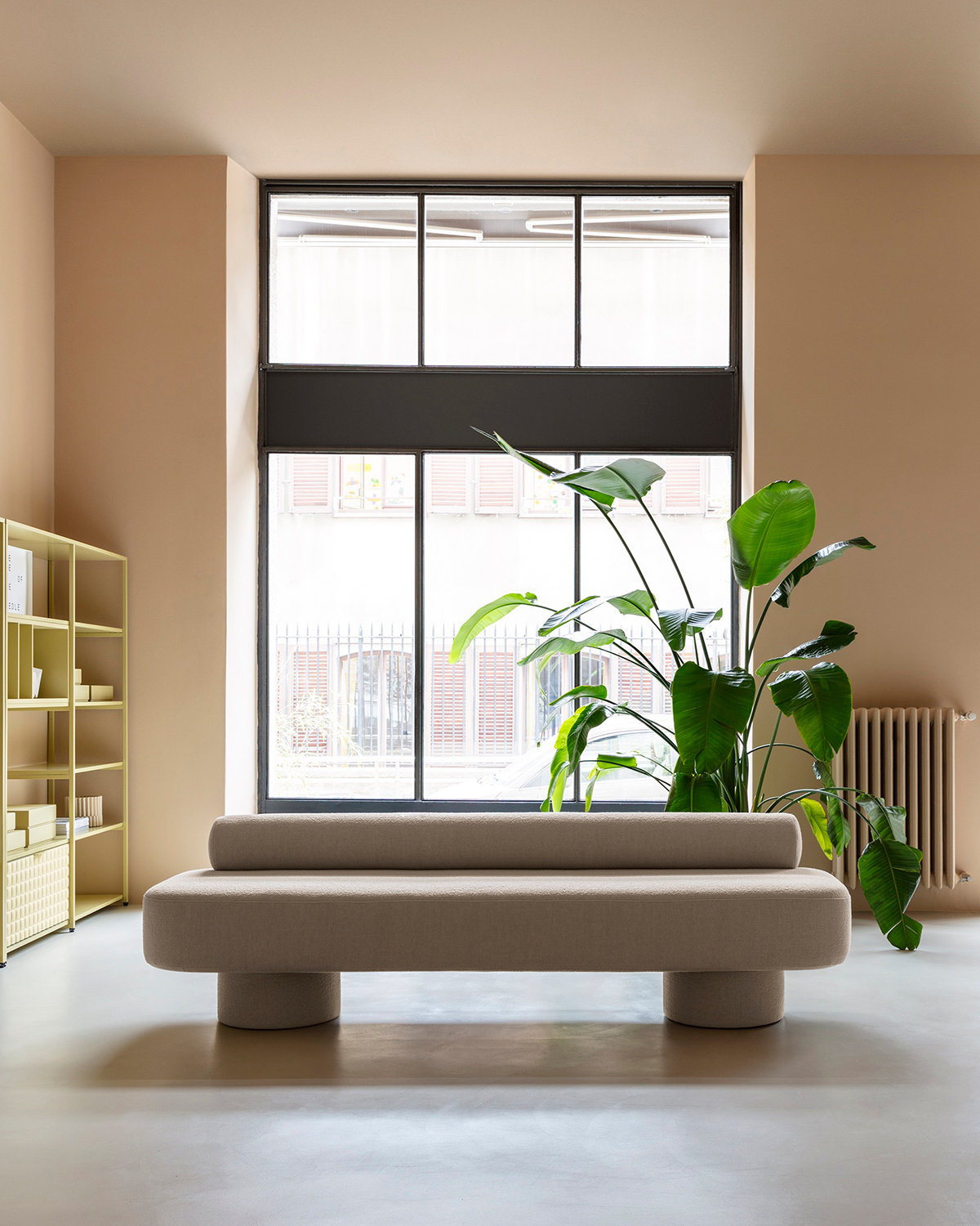 Zoey Seating from Dieffebi includes benches with cylindrical backrests