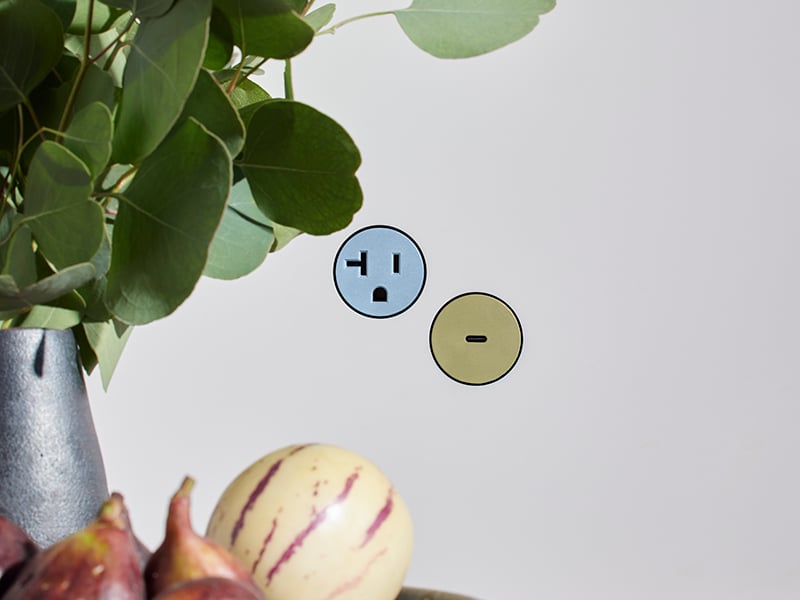 Blue and green electrical outlets