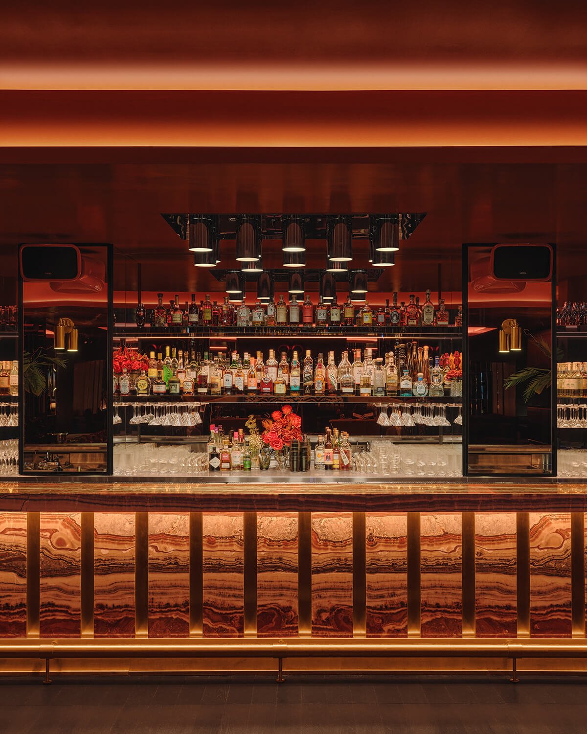 Red marble bar with brass accents