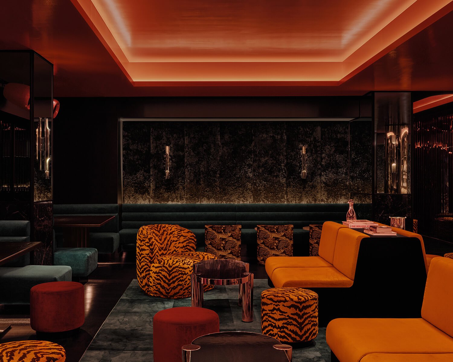 Lounge with orange, red and tiger-print furnishings