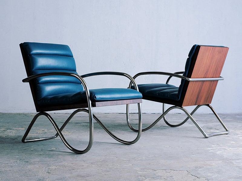 Galerie Patrick Seguin: Charlotte Perriand x Saint Laurent poster with blue chairs