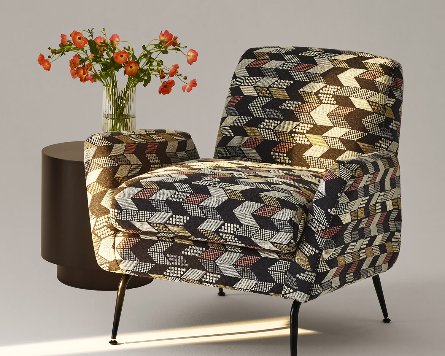 Chair upholstered in Parallelogram textile