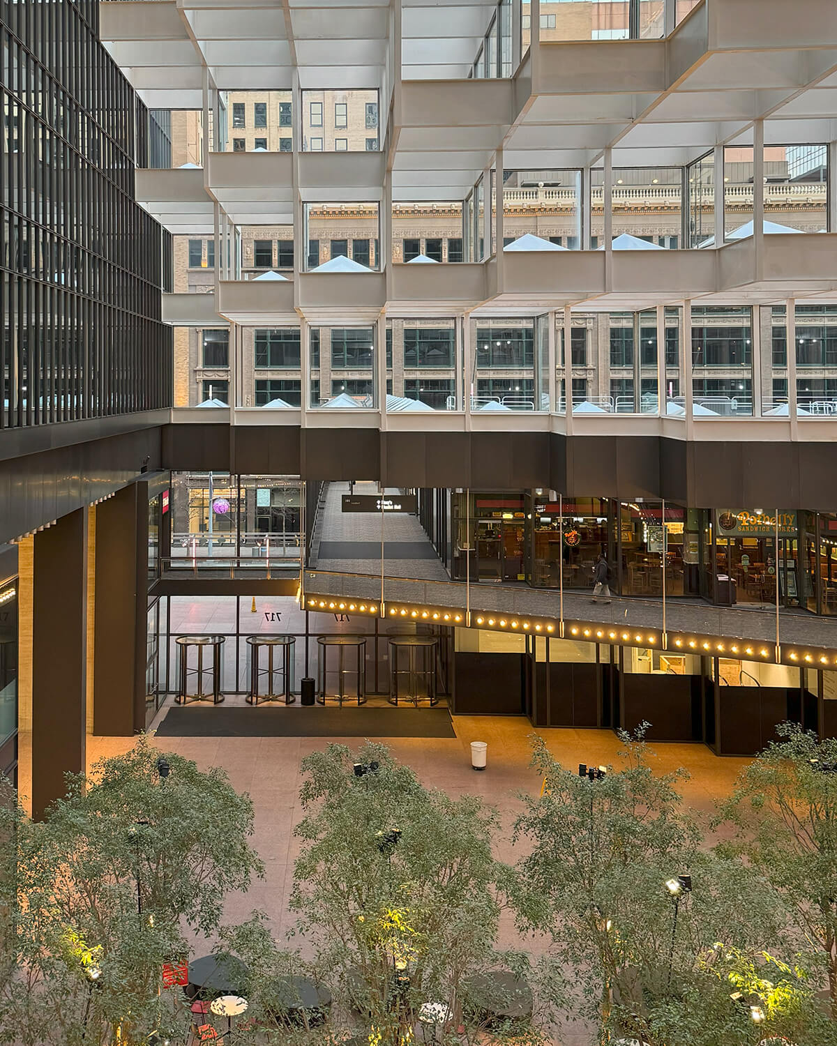 Interior view of IDS Center in Minneapolis showing the relationship of the walkway system to the covered court. PHOTO: Felipe Correa