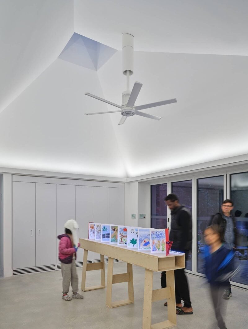 A simple structure finished in hardy materials, the Belle funnels up to dramatically tapered skylights.