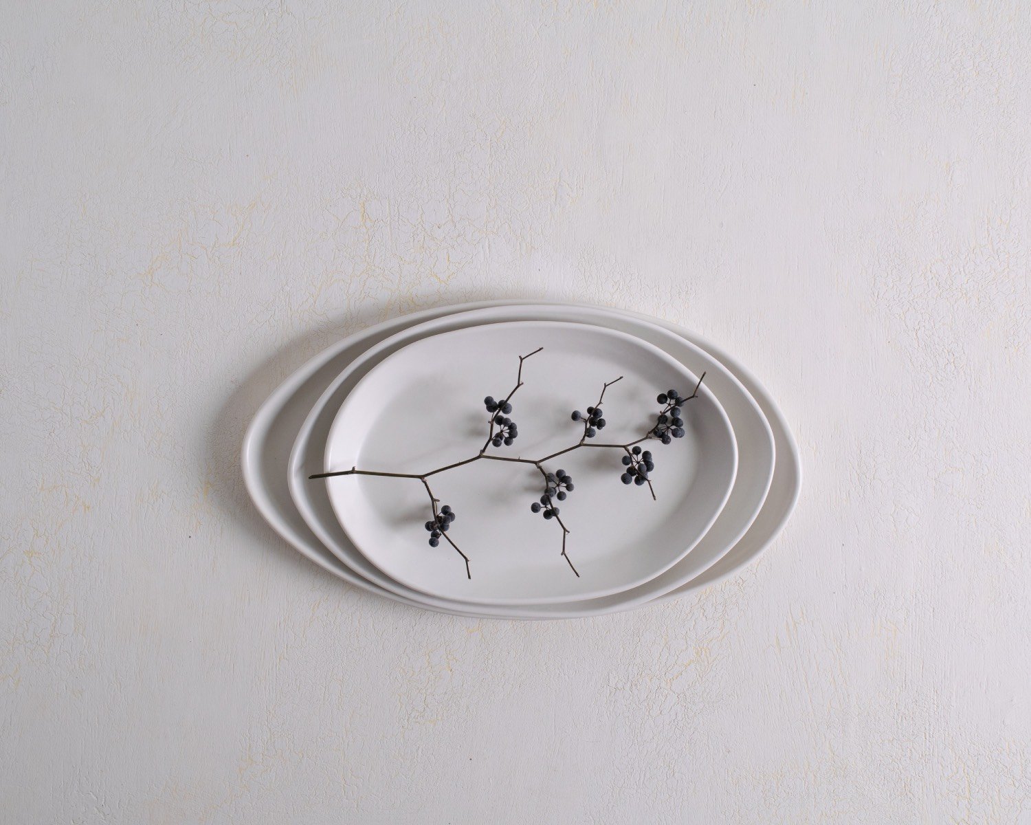 Oval serving platters in matte white by Haand