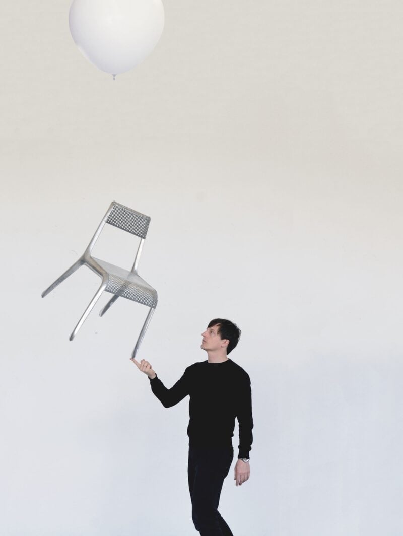 Oskar Zięta shows off the Ultraleggera chair.
