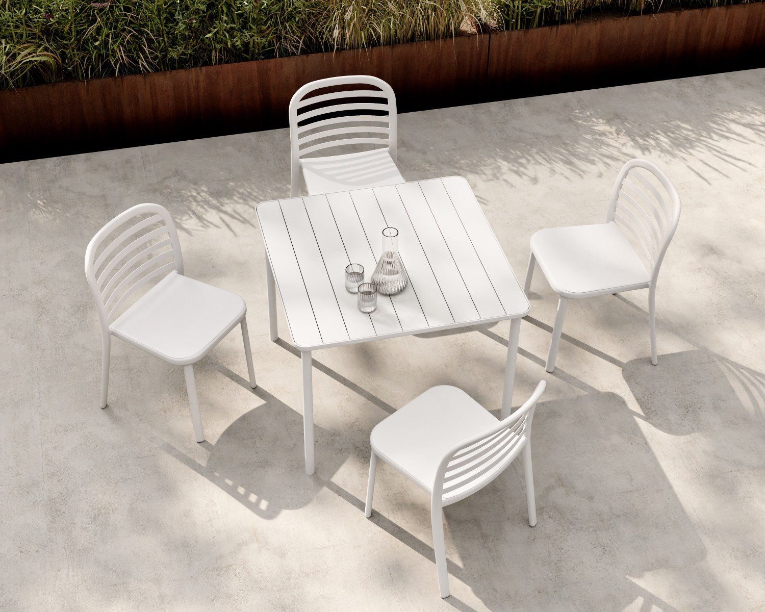 White dining set on a patio
