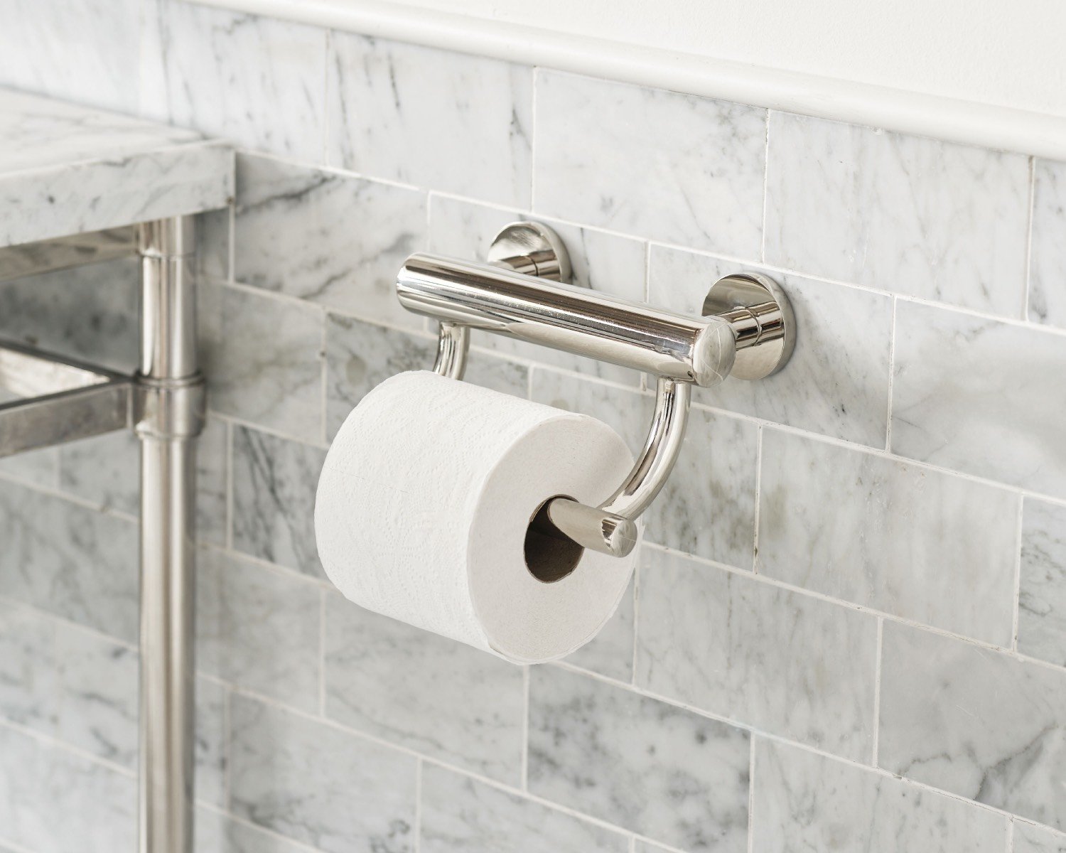 Toilet paper holder/grab bar