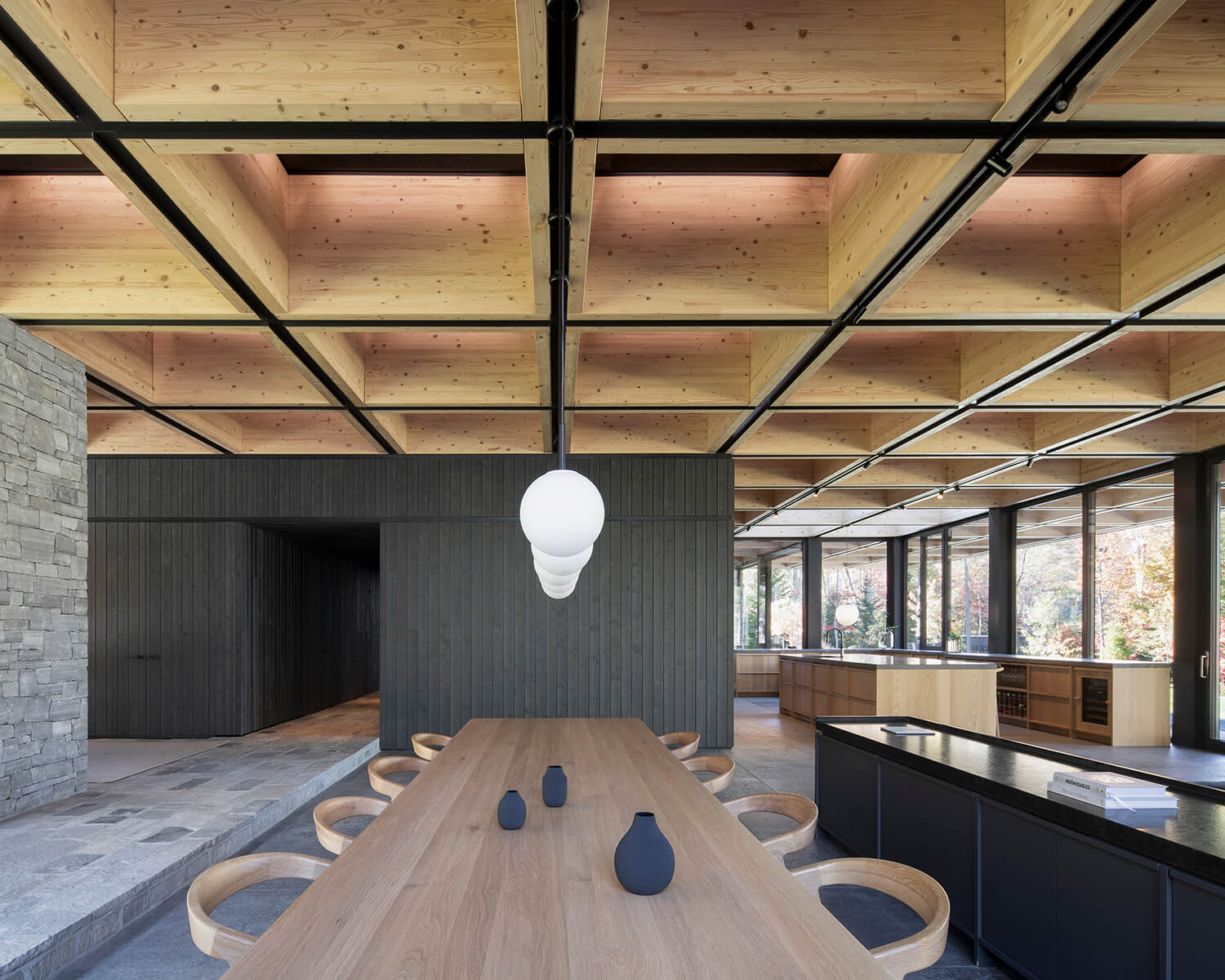 In this ACDF-designed chalet, the coffered roof features integrated linear LEDs that illuminate and accentuate the wood’s grain and acoustic panels that contribute to the home’s overall sense of intimacy and calm.