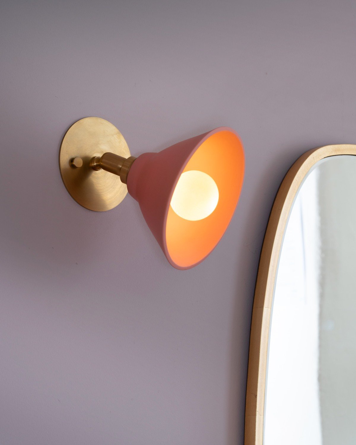 Pink and orange wall sconce