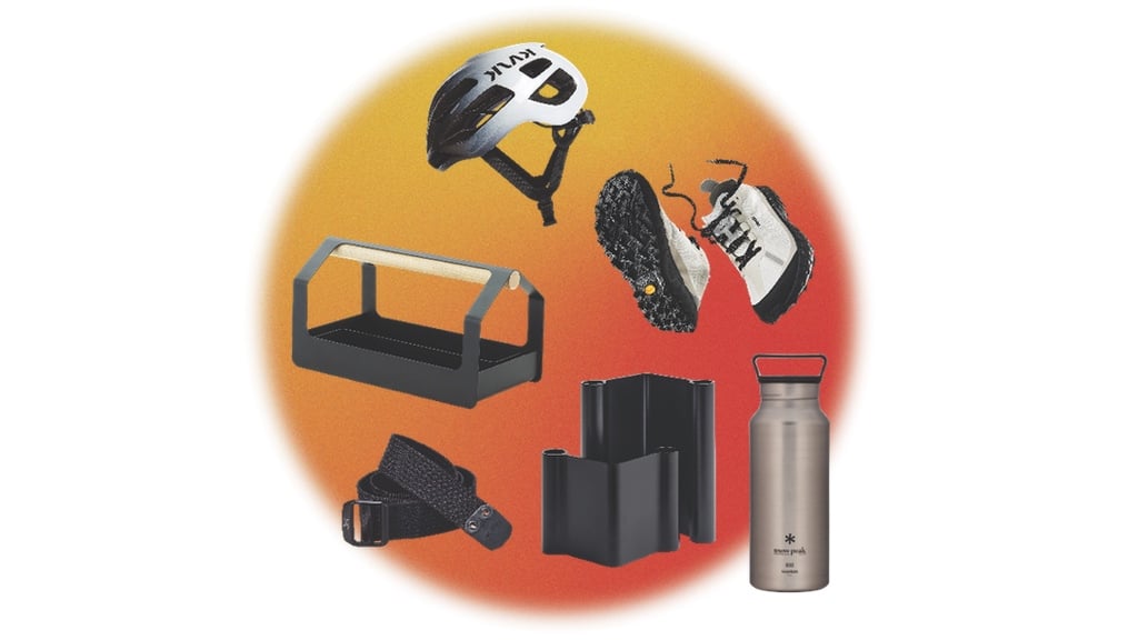 The 2025 Azure gift guide features great gift ideas for architects and designers who love wearing all black, including a bike helmet, toolbox, sneakers, water bottle, belt and candleholders shown in a collage against a textured orange background.