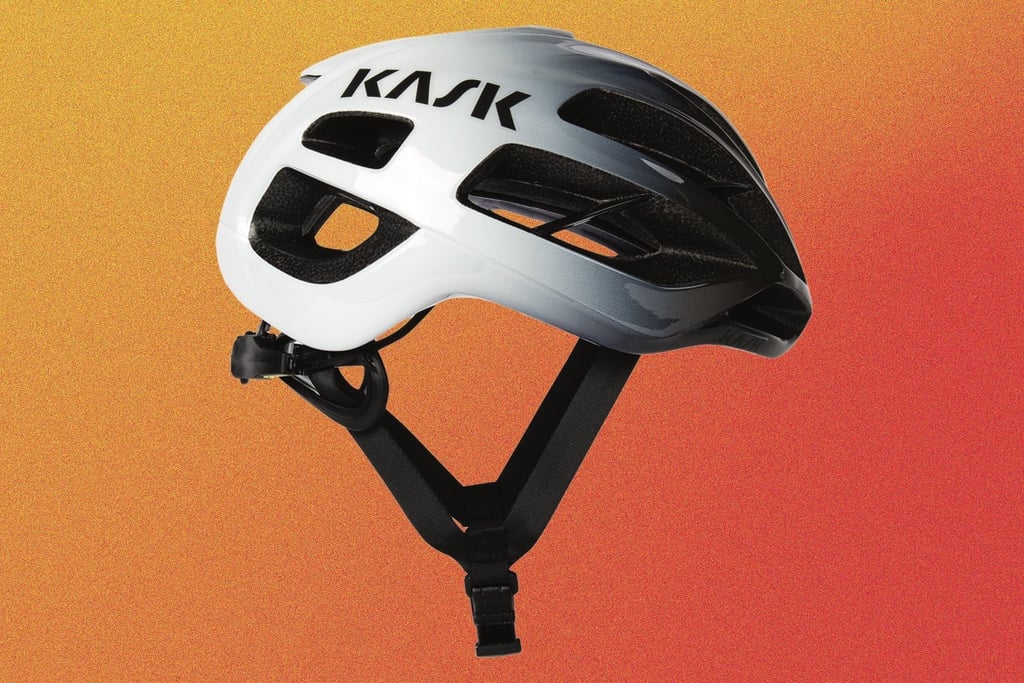 The 2025 Azure gift guide features great gift ideas for architects and designers who love wearing all black, including a bike helmet shown against a textured orange background.