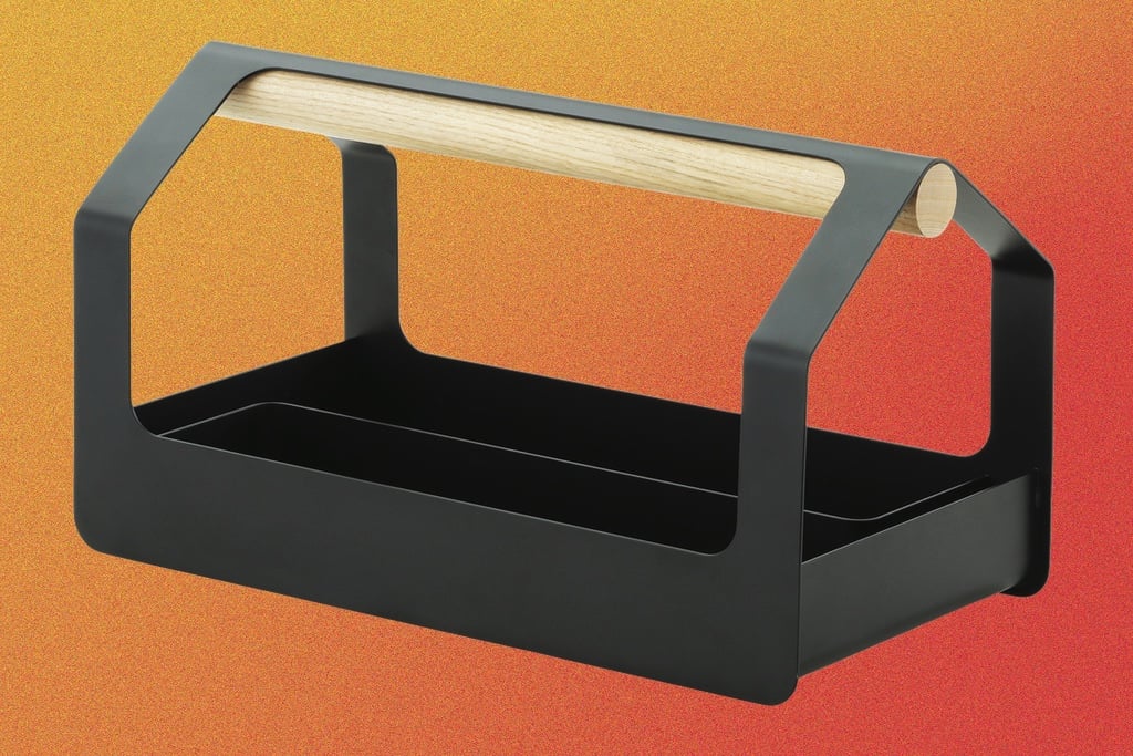 The 2025 Azure gift guide features great gift ideas for architects and designers who love wearing all black, including a metallic toolbox shown against a textured orange background.