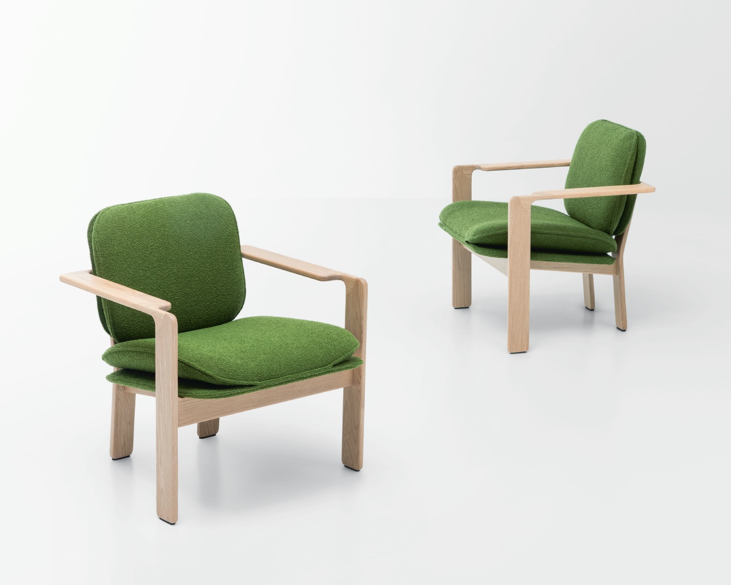 Green chairs with wood frames
