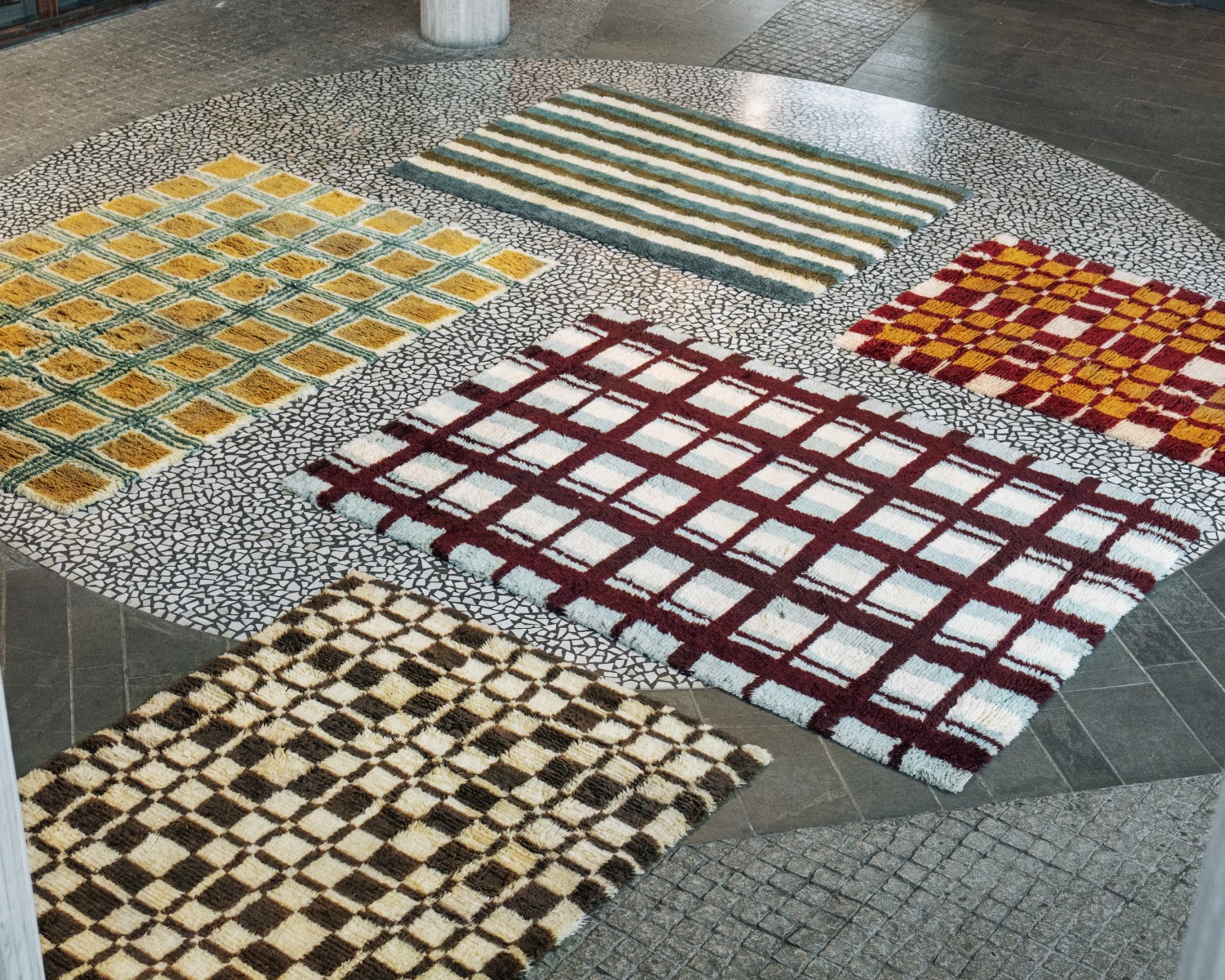 Colourful rugs as seen from above