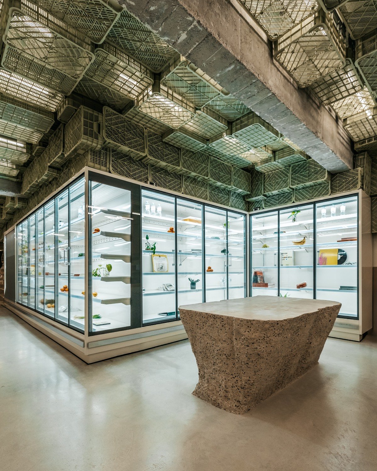 Minimal Studio used recycled produce crates to create the illuminated ceiling installation