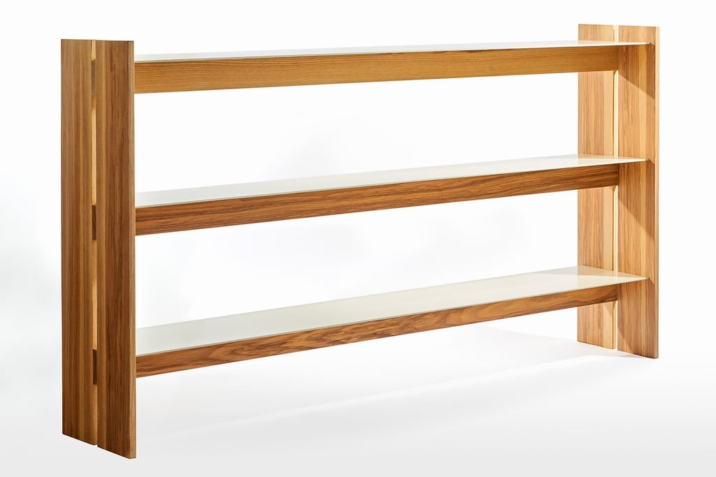 A wooden bookshelf designed by MSDS for the modern Canadian furniture brand Ourse.