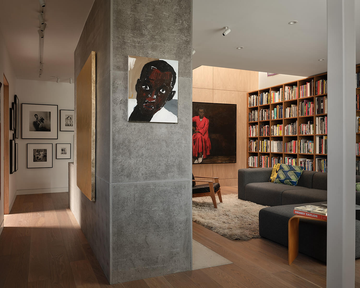 The library, which features hundreds of art books in a wall-to-wall wooden built-in, is also home to a teak and leather armchair designed by Kenneth’s father, Spurgeon Montague.