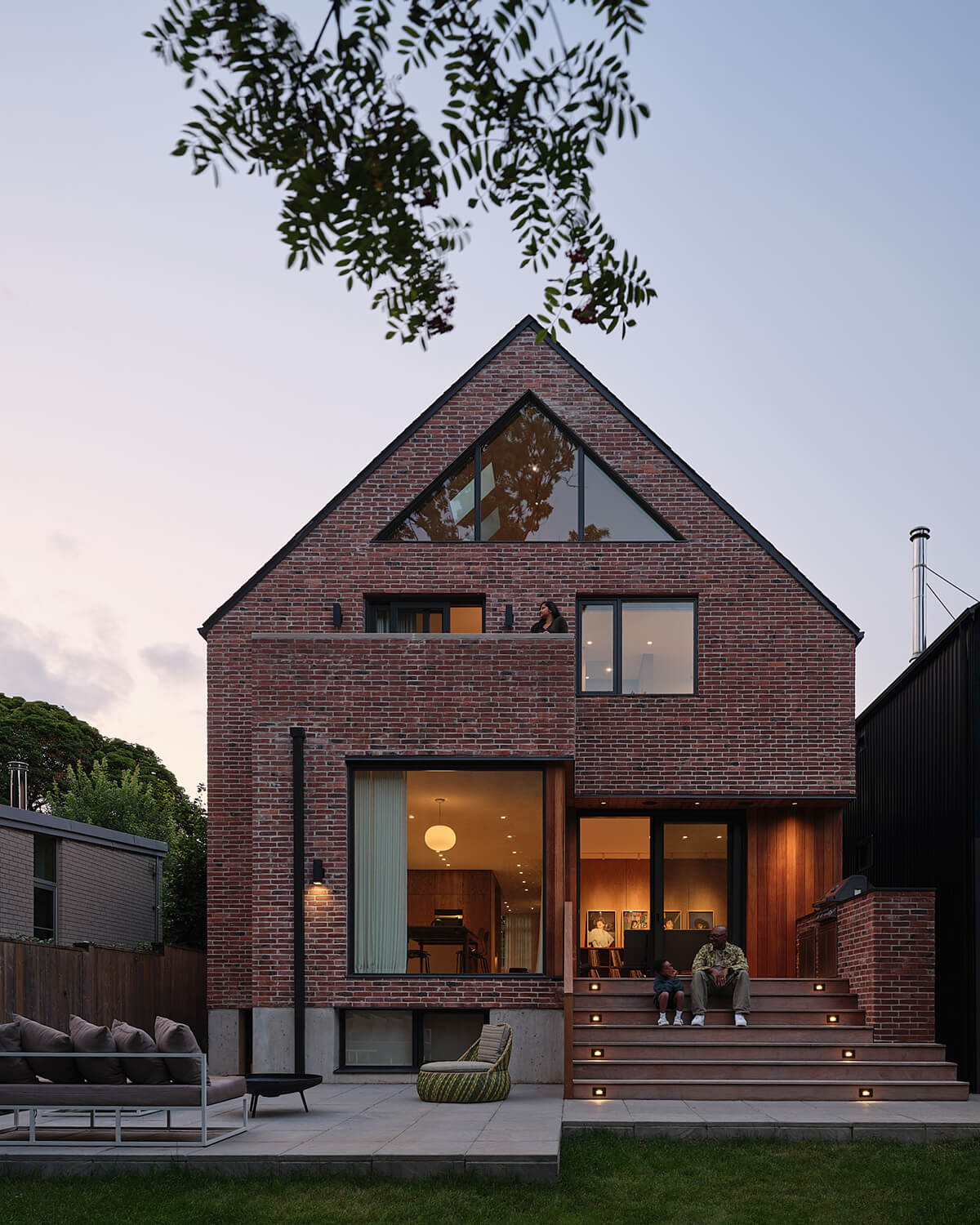 The rear addition of the Montague House is clad in handmade bricks sourced from Belgium, tying in to the classical nature of the original arts and crafts–style home.