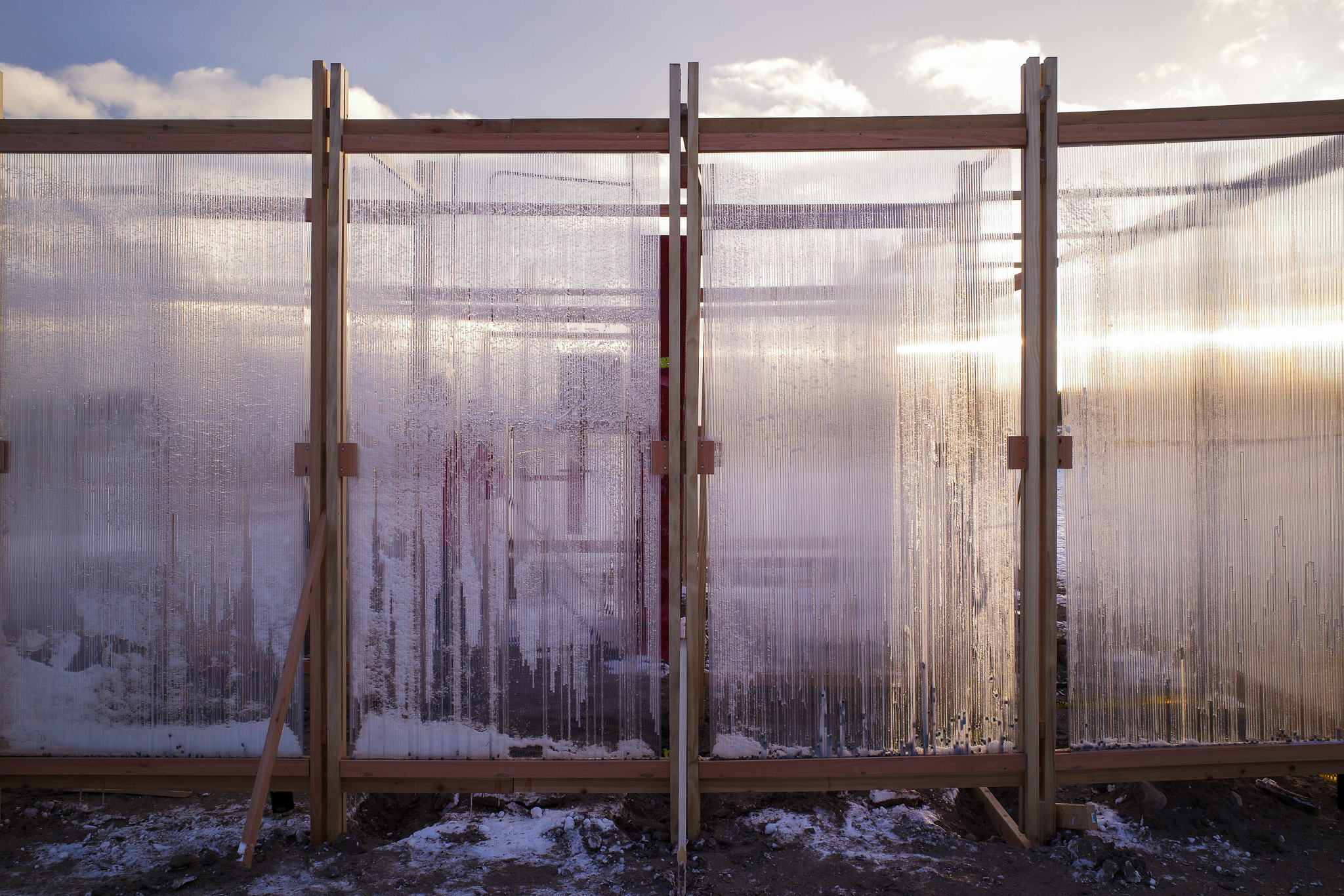 A closeup of the water-filled polycarbonate panels that encase one of the installations at Winter Stations 2026 in Toronto.