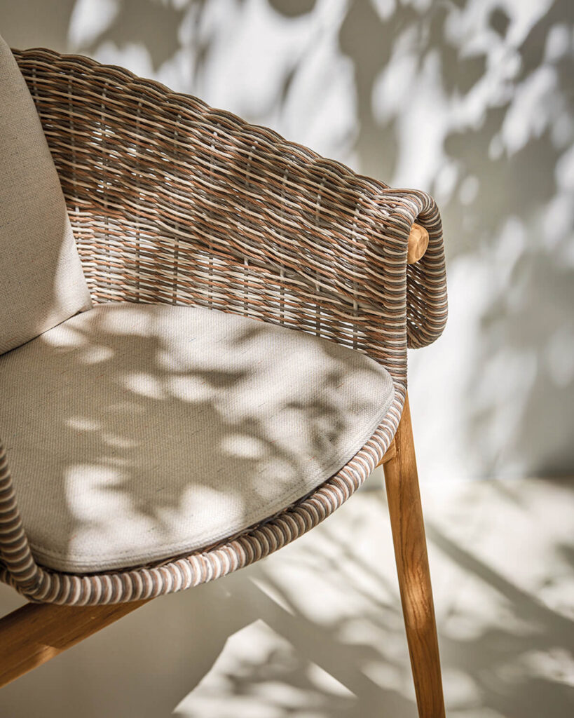 Close-up of woven outdoor dining chair