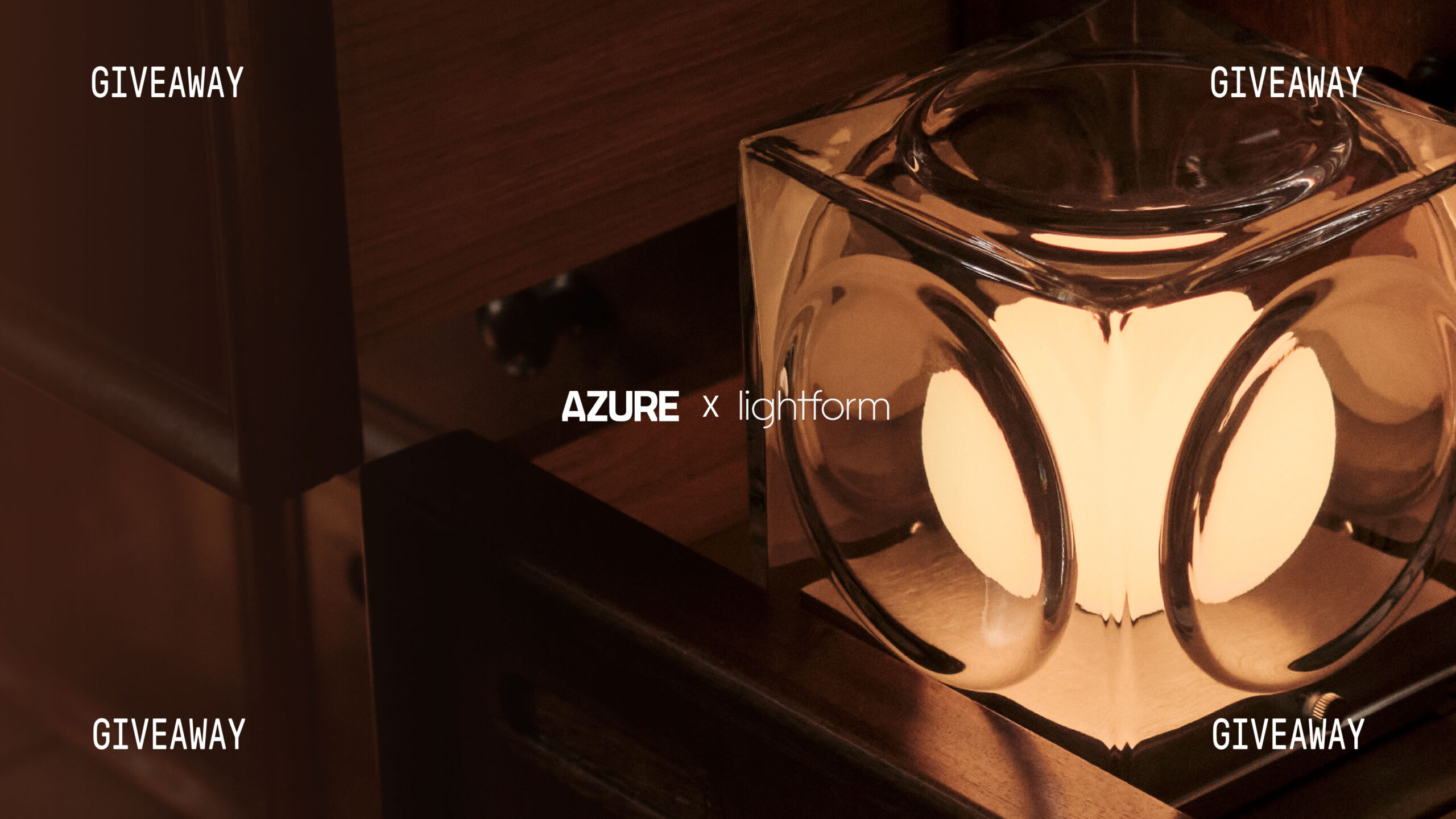 A glowing, cube-shaped lee broom portable lamp sits on a wooden surface, with "AZURE x lightform" and "GIVEAWAY" repeated in the corners.