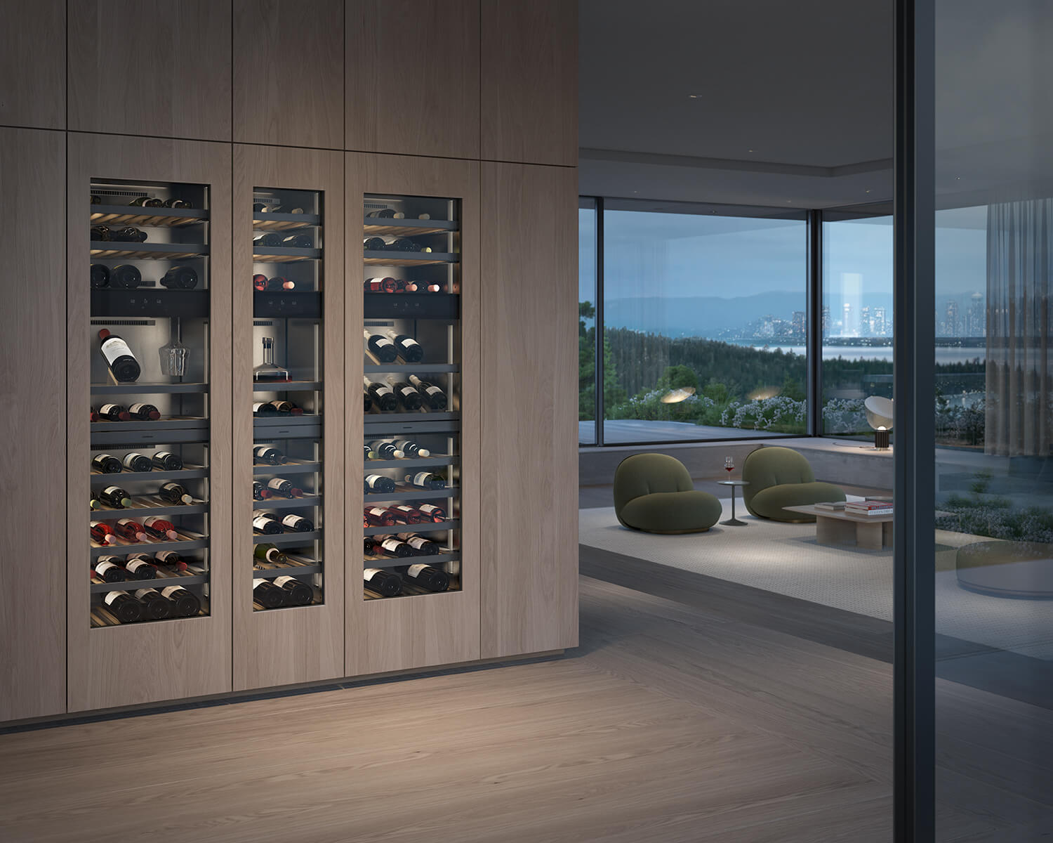 A built-in wooden wine fridge with Gaggenau Vario Cooling, filled with bottles, stands next to a modern living room with large windows overlooking the city and landscape.